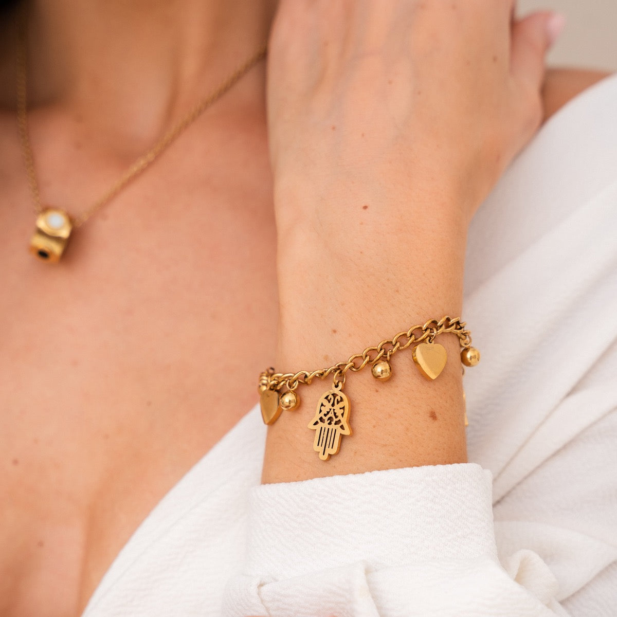 Hamsa Hart Bedelarmband - Goud